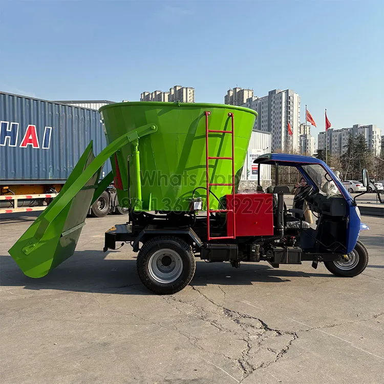 Hydraulic loading and outlet of silage feed spreader