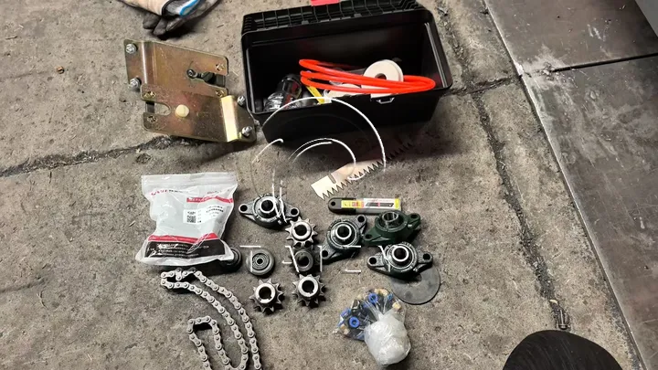 Parts for round bale wrapping machine